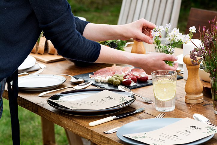 Person Setting The Table